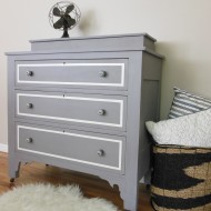 A plum-grey dresser with modern lines