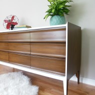 A walnut and white mid century dresser