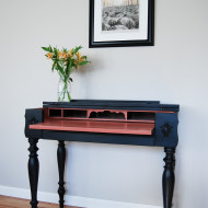 A Black and Salmon Spinet Desk