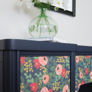 Adding Paper to Furniture: a navy desk with flower patterned paper