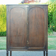 An Antique Cabinet and a Survey