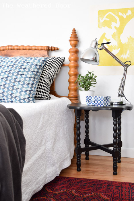 Black side table and Birds Eye Maple Jenny Lind bed frame from theweathereddoor.com